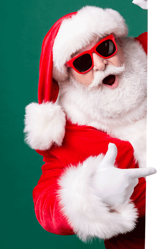 santa-trans Santa pointing at a blue wall
