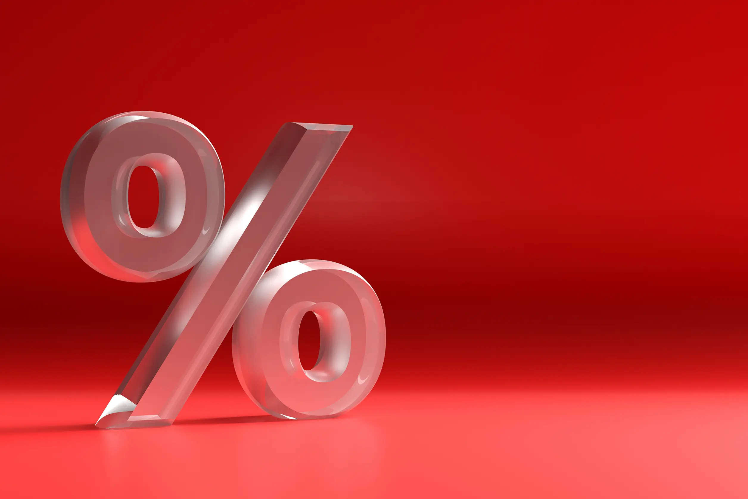 large 3D percentage symbol on a red background