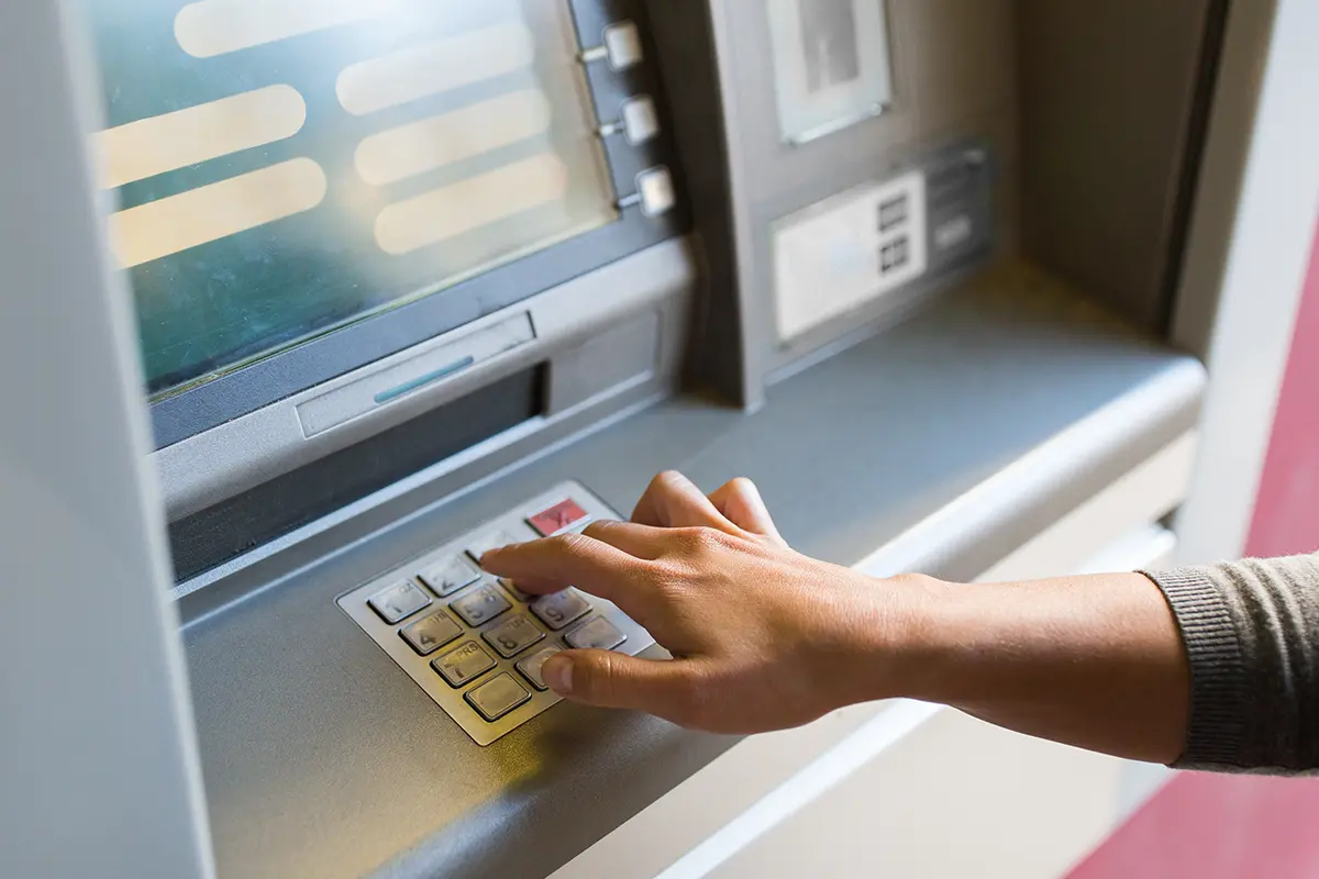 woman using atm